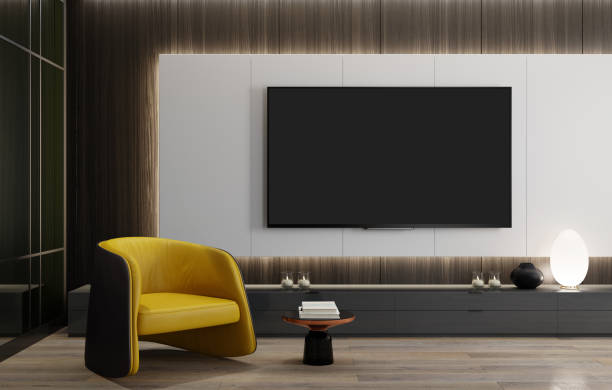 8k tv zimmer modernes minimalistisches wohnzimmer mit flachbildfernseher mit led-leuchten hinter wandpaneel - entspannung grafiken stock-fotos und bilder
