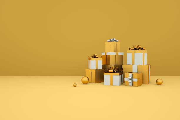istock Various sized gifts wrapped with yellow bows & ribbons 1282228069