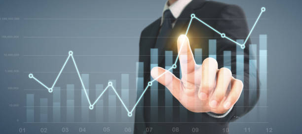 istock Businessman plan graph growth and increase of chart positive indicators in his business 1282229801
