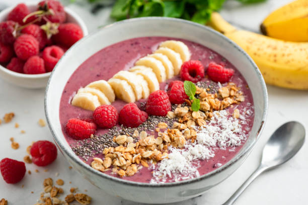 istock Vegan raspberry smoothie bowl with superfood toppings 1282244368
