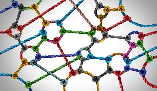 Connection network concept and connected diversisty as circle shapeed group of ropes creating a connected networking horizontal composition as a connect concept for business or social media.