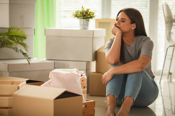 istock Sitting among boxes and reminiscing on old memories 1282249166