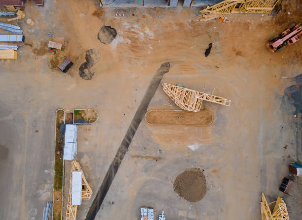 istock Beam of new apartments under construction home residential building development 1282251809