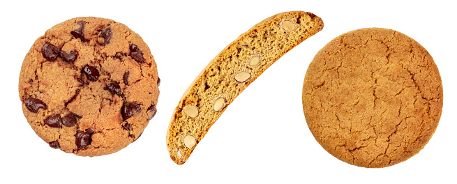 Cookies set, isolated on a white background. Chocolate chip cookie, biscotti and a gingersnap, overhead shot