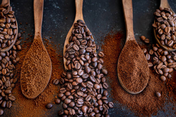 istock Many roasted coffee beans on the table. 1282254937