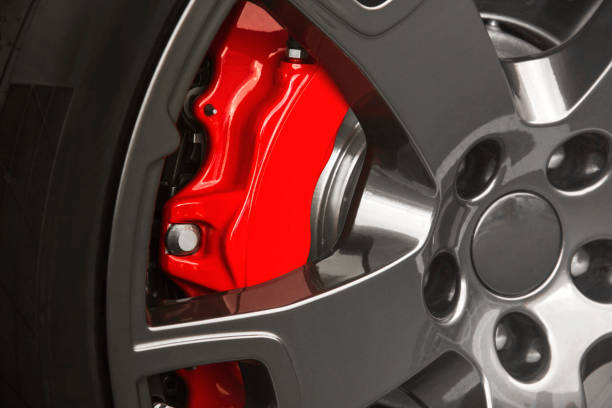 istock Car wheel. Brake discs. Red car caliper. Background. For advertising. 1282256916
