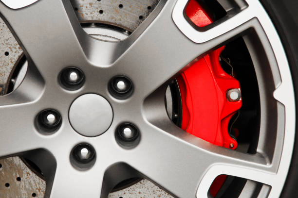 istock Car wheel. Brake discs. Red car caliper. Background. For advertising. 1282258092
