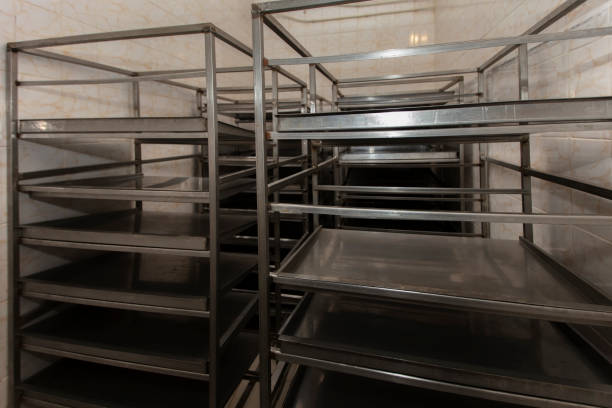 istock Empty metal pallets in production. Metal production carts. 1282259210