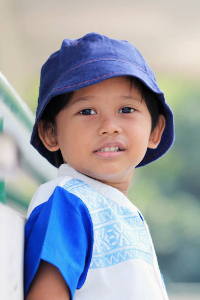 istock A boy takes a photo with a cheerful expression 1282261914