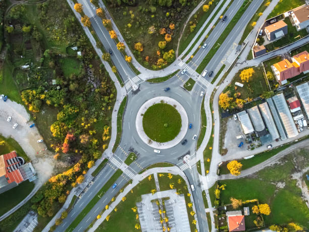 istock autumn roundabout with traffic top aerial drone view 1282262048