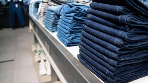 istock A stack of jeans in a clothing store. Banner for black Friday ads. Selective focus. Copy space. 1282263159