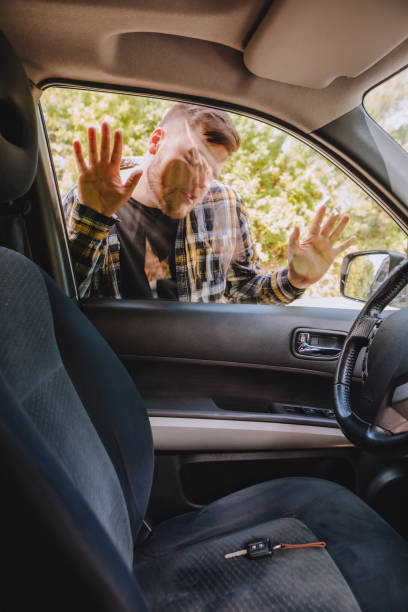 istock man locked car and forget keys inside 1282263414