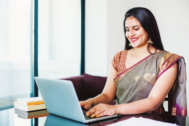 istock Indian woman working from office 1282263613