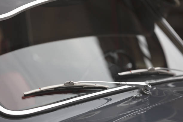 istock Glass windshield and windshield wiper of a classic car 1282268946