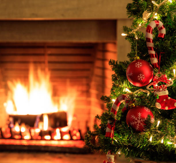 istock Fireplace burning wood logs, cozy warm home christmas time 1282269183
