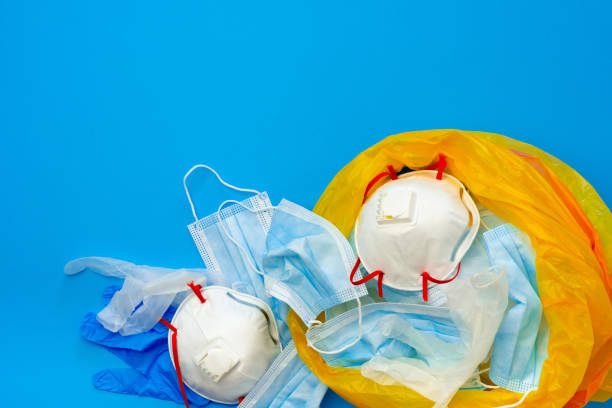 istock Protective equipment, masks and gloves, on blue background 1282270589