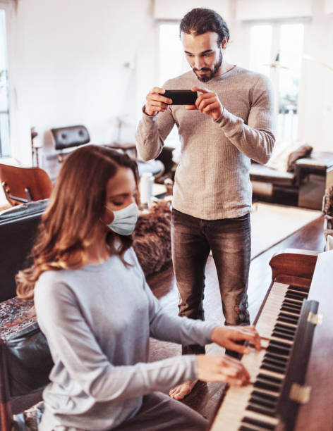 istock playing the piano together during the lockdown 1282272772
