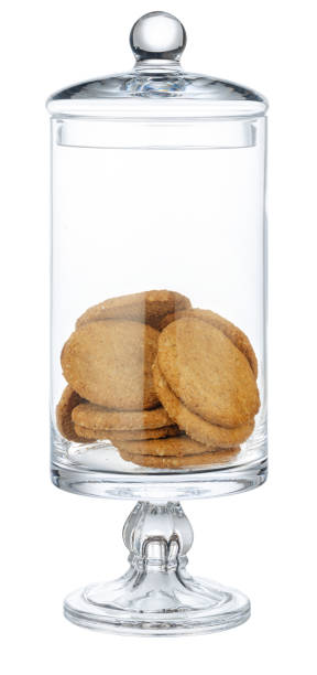 istock Glass storage jar for cookies isolated on white 1282272827