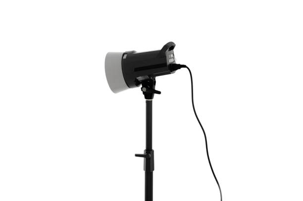 istock Studio lights and flash bulbs are available separately on white background. Photography equipment with professional technology 1282273955