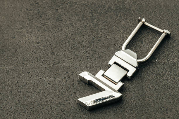 istock Metal number SEVEN car key on dark concrete background 1282274465