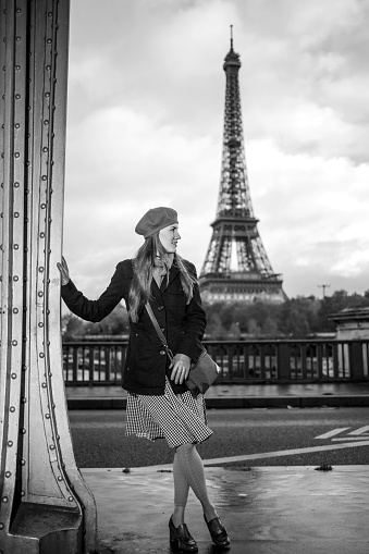 Young stylish woman in Paris, black and white