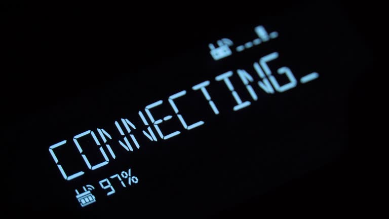 A text message appearing with a decoding fx and a deep glow: connecting,