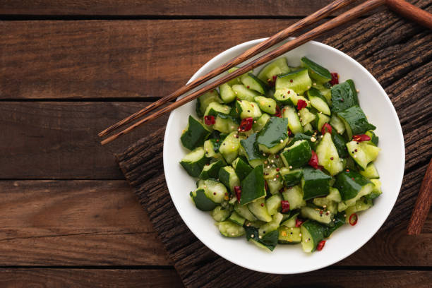 istock fresh cucumber salad with chilli on wood 1282278679