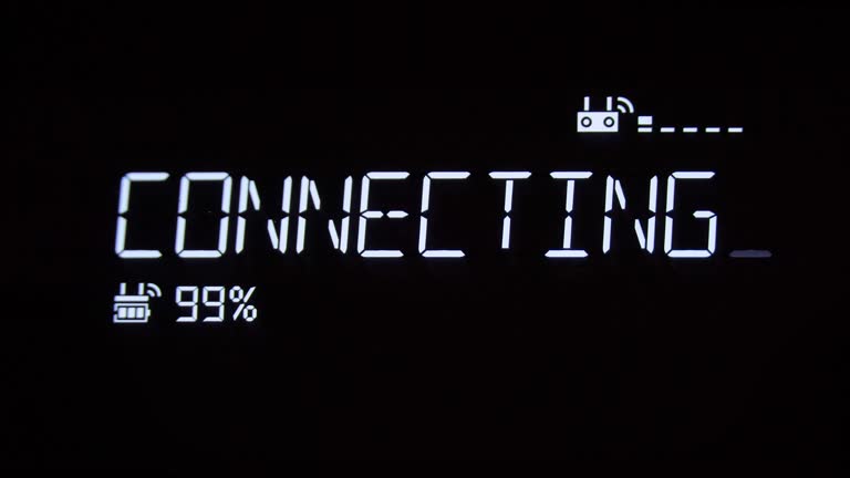 A text message appearing with a decoding fx and a deep glow: connecting,