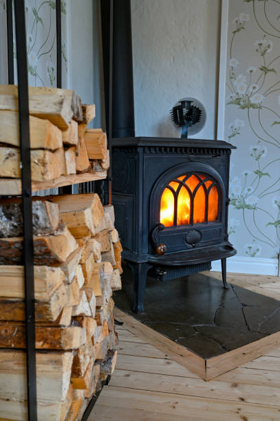 istock cast iron stove with small fan on top 1282281961