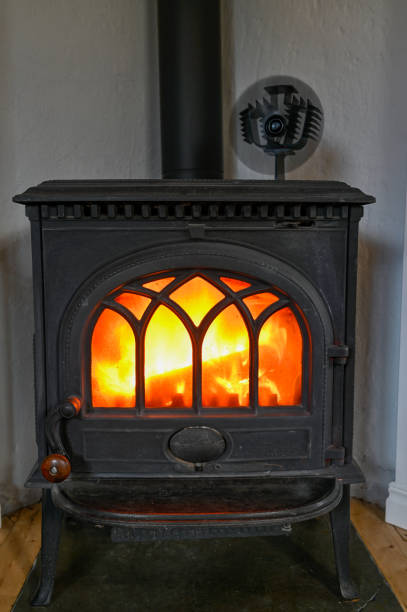 istock cast iron stove with small fan on top 1282281981