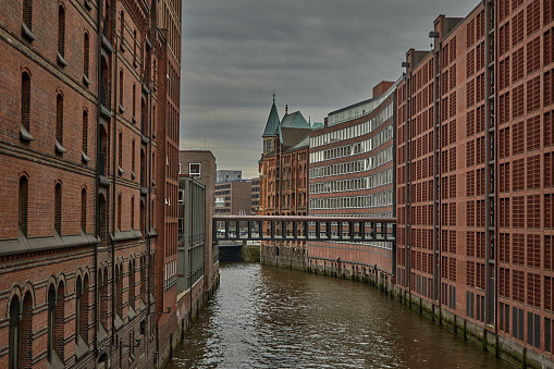 Docks in Hamburg, Germany. Speicherstadt in Hamburg, Germany. Channel and brick buildings in Hamburg, Germany.
