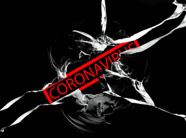 istock Coronavirus. Covid-19. Text behind broken glass. Coronavirus pandemic concept. 1282284930