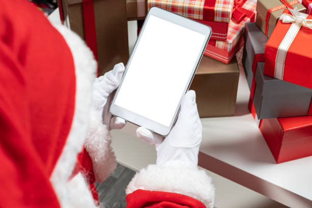 istock Over Shoulder View Of Santa Claus Having Video Call 1282287500