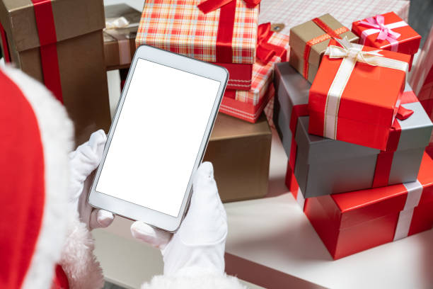istock Over Shoulder View Of Santa Claus Having Video Call 1282287624