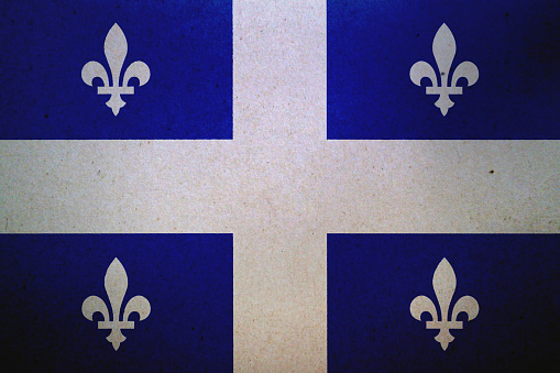 Flag of Quebec (Canada) printed on a paper sheet.