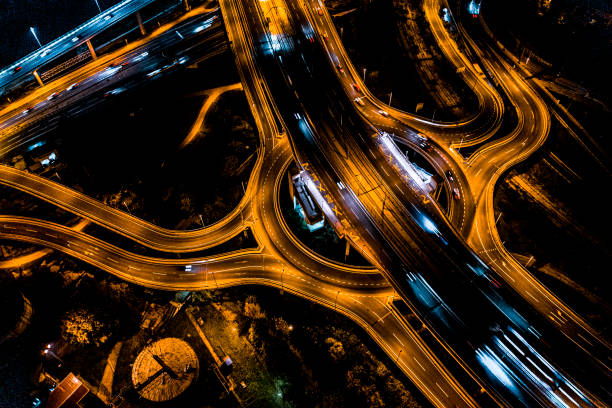 istock City road intersection seen directly from above at night 1282290055
