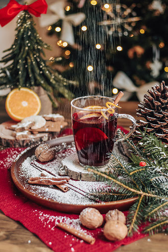 Christmas Mulled Wine Glühwein with spices and christmas tree