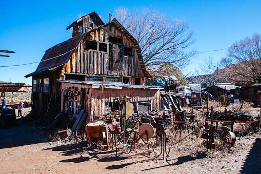 Jerome, USA - February 4, 2013: The iconic tourism hotspot that is the Gold King Mine Museum and ghost town on a clear day near Jerome in Arizona USA