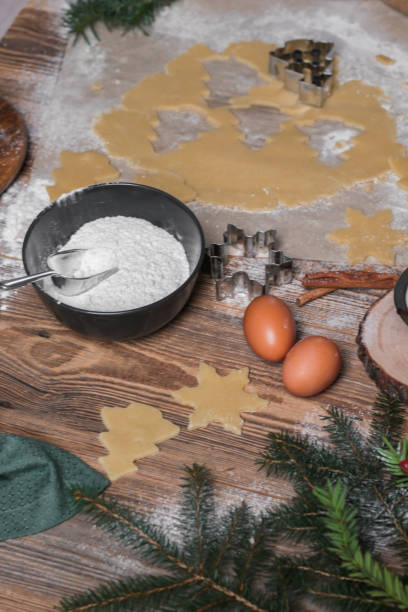 istock Baking homemade Christmas cookies on rustic wood table 1282291152