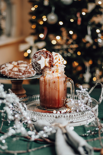 Cozy Christmas Coffee with whipped cream, caramel and gingerbread