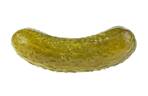 istock Delicious marinated pickled cucumber isolated on a white background 1282293763