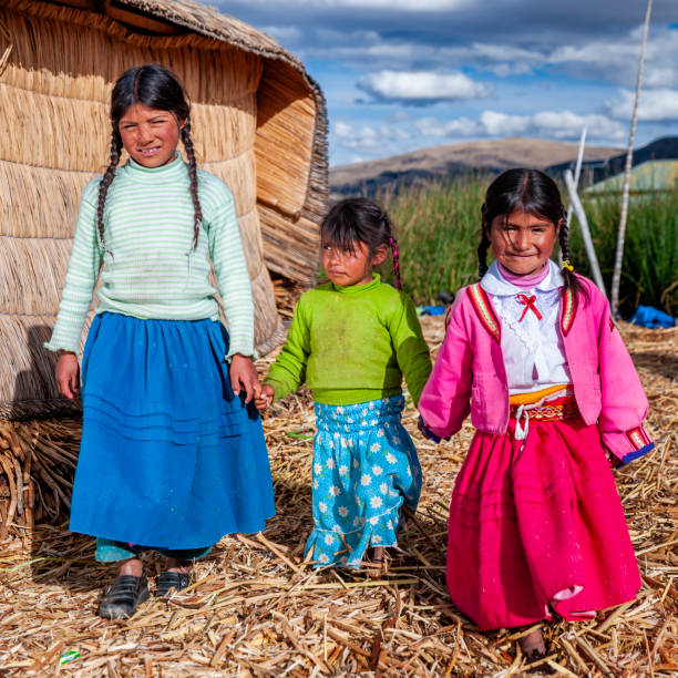 istock Happy children on Uros floating island, Lake Tititcaca, Peru 1282293839
