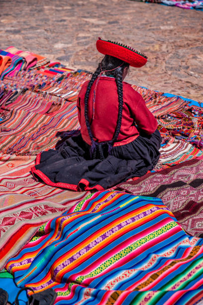 istock Peruvian woman selling souvenirs, The Sacred Valley, Peru 1282293897