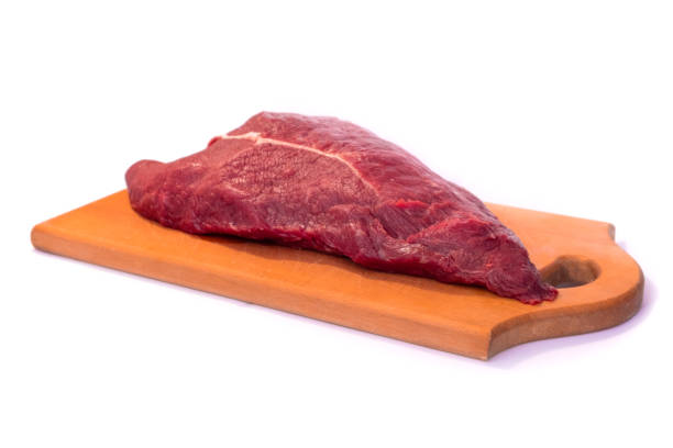 istock Fresh raw beef steak isolated on white background. Close up raw meat beef. 1282294091