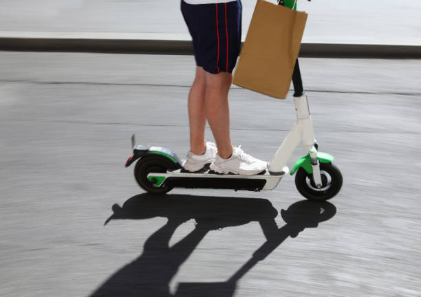istock shopping with an electric scooter 1282294217
