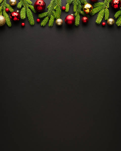 istock Black christmas background with christmas tree ornaments 1282294528