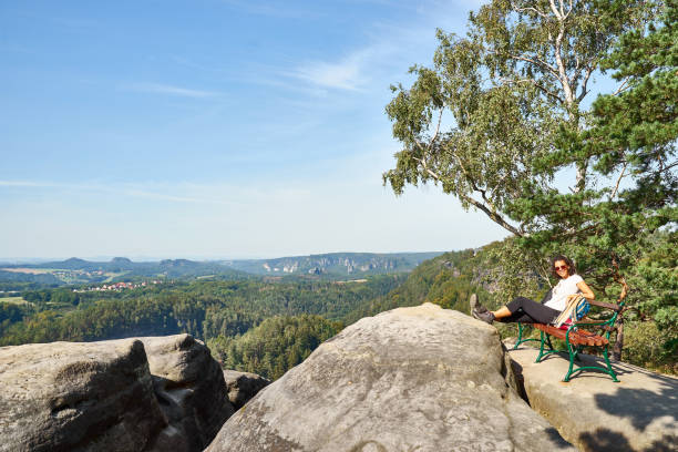 istock Black woman relaxing on top of a Mountain 1282298067