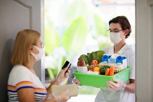 istock Food delivery during virus outbreak. Face mask. 1282298254