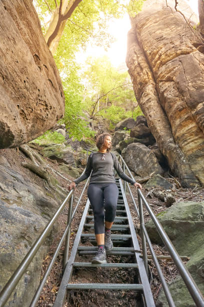 Black woman hiking in Elbe sandstone Mountains
