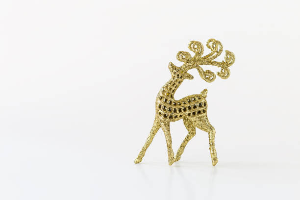 istock Design gold glitter reindeer isolate on white background 1282301283